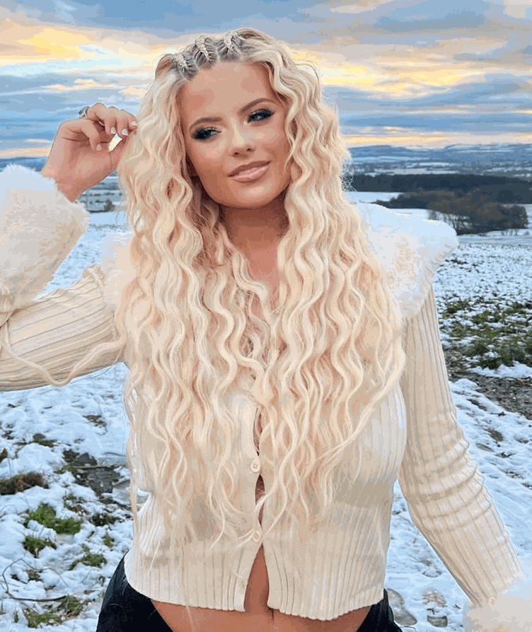 Woman with long healthy hair wearing Halo Hair Extensions UK outdoors in winter