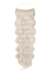 Close-up of wavy Syn Halo hair extensions in natural shades showcasing lightweight, durable synthetic Kanekalon fibers