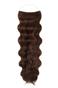 Close-up of a model wearing luxurious wavy Syn Halo hair extensions made from premium Kanekalon for a natural, lightweight look