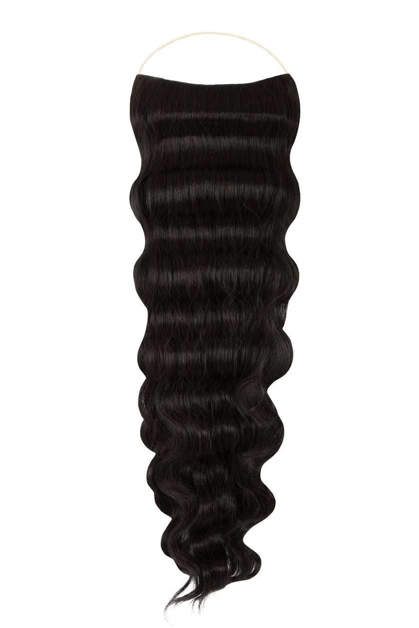 Close-up of wavy Syn Halo hair extensions made from premium Kanekalon synthetic fibers, showcasing natural look and lightweight design.