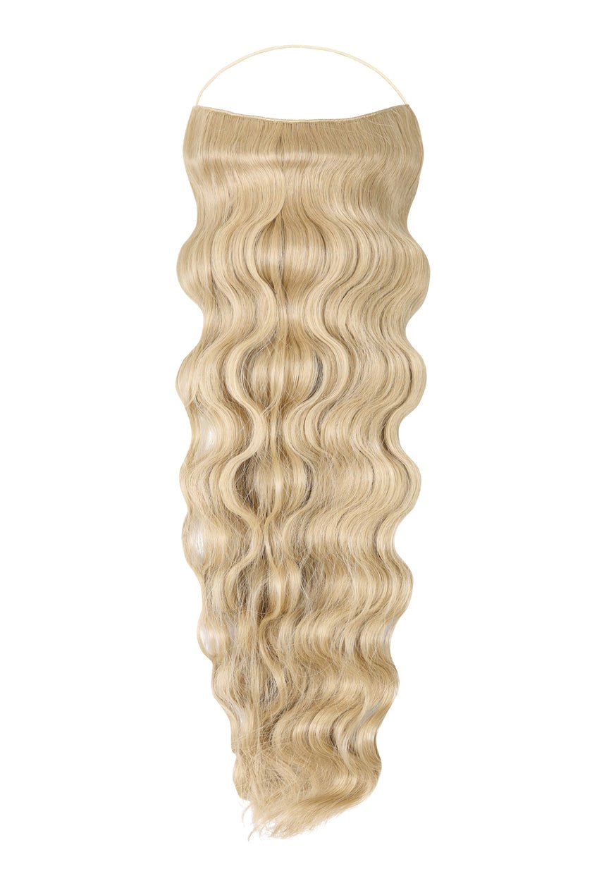 Close-up of premium wavy Syn Halo hair extensions made from lightweight Kanekalon with seamless natural look and hidden wire design