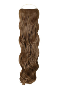 Woman wearing premium Curly Syn Halo Hair Extensions with natural, voluminous curls